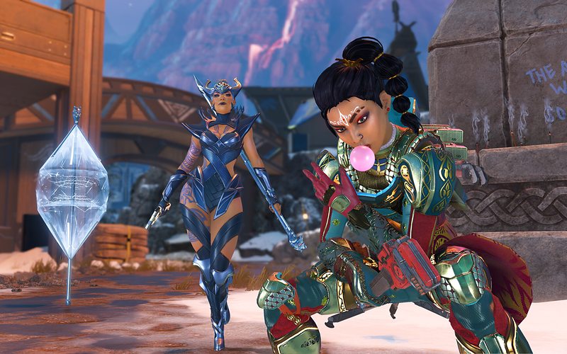 Two Legends crouched beside a crystal marker