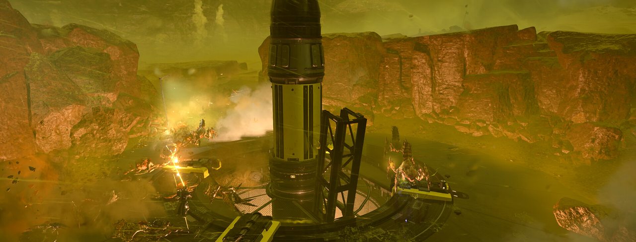 A rocket on a launch pad in a hazy yellow alien landscape