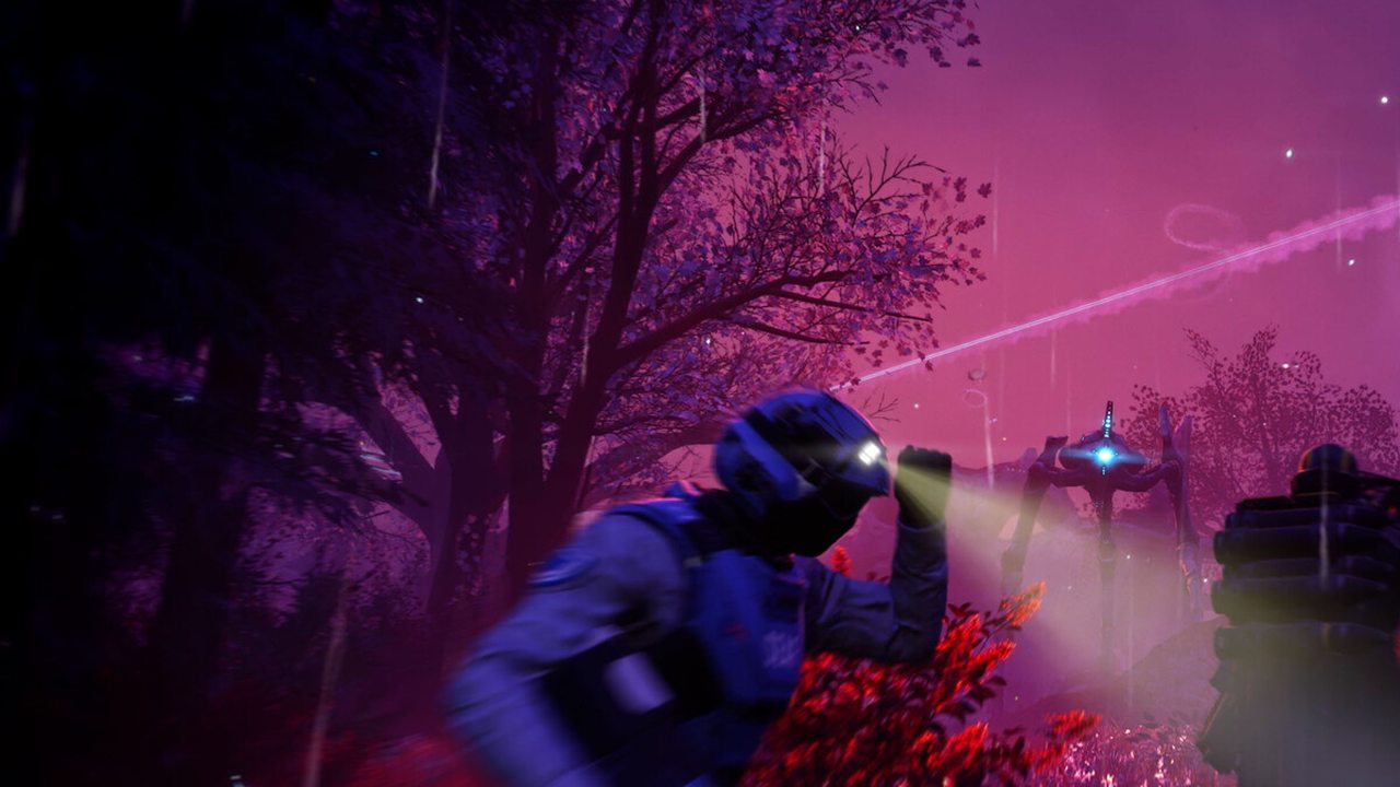 A lone Helldiver with a torch in a violet night