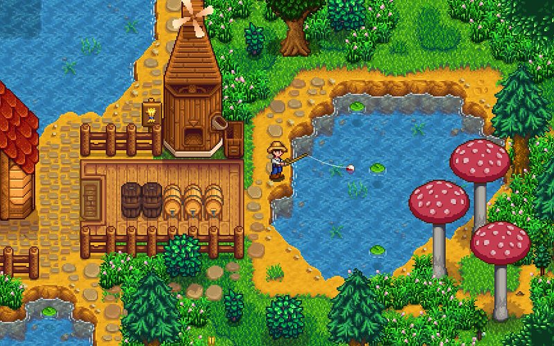 A windmill and fishing pond on a summer farm