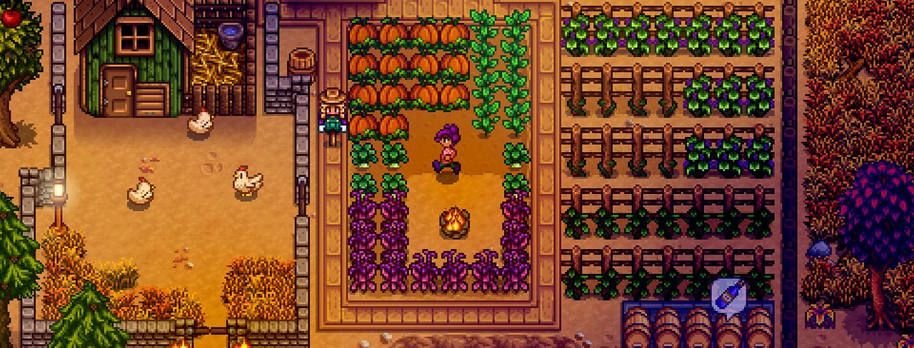 An autumn farm with a barn, pumpkins and neat fields
